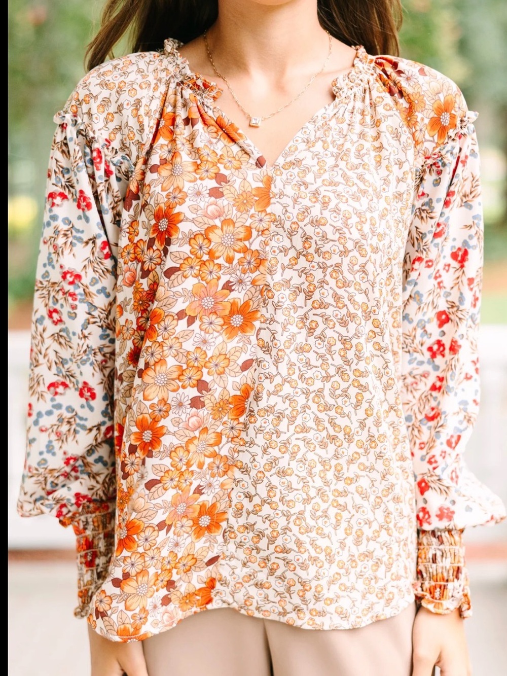 Umgee mixed print blouse size large